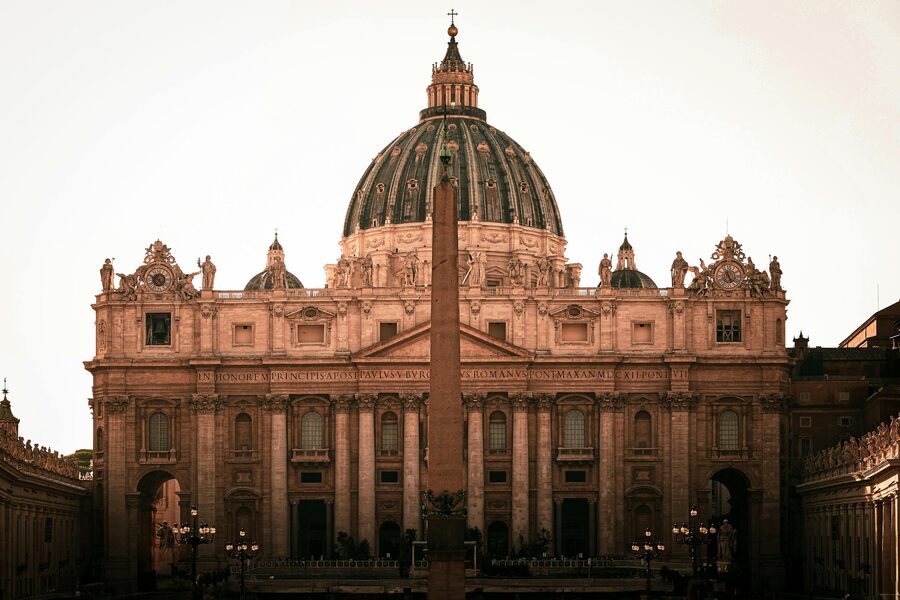 Frontal view of St Peters Basilica with the Egyptian obelisk in St Peters Square