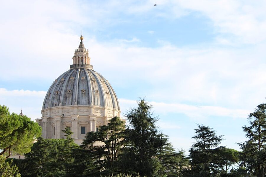 St Peters Basilica dome rising above the Vatican gardens