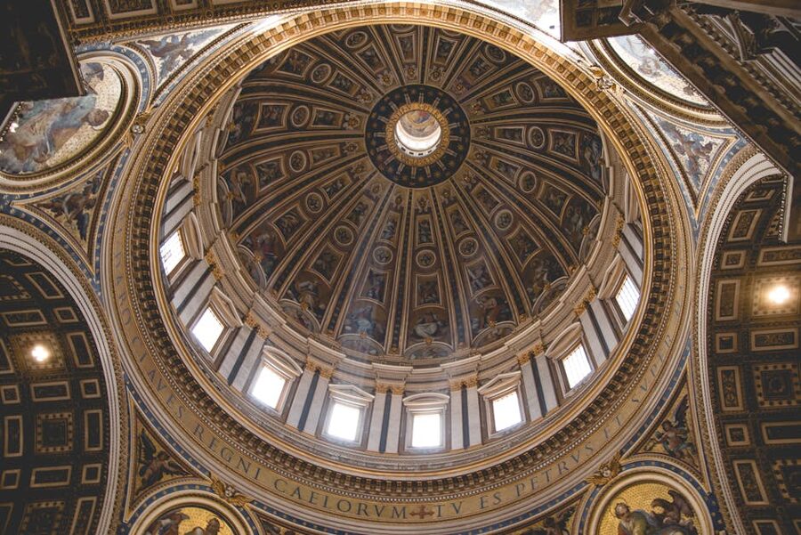 St Peters dome interior flooded with golden natural light