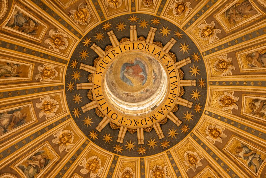 Ornamental design of the dome ceiling inside St Peters Basilica