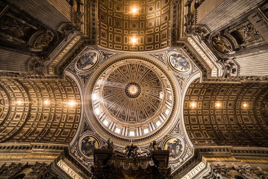 Religious art visible on St Peters dome looking up from below