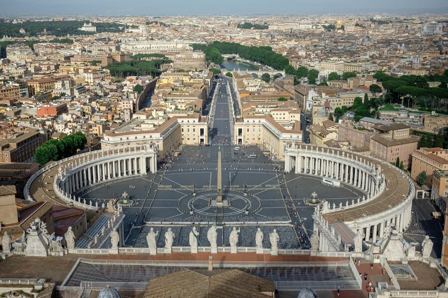 Aerial view of the full St Peters Square and Basilica from above