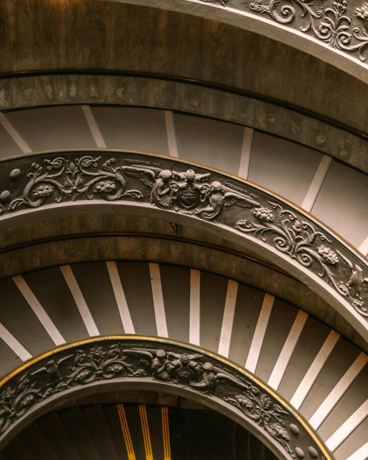 Bramante-inspired spiral staircase with detailed carvings in the Vatican Museums
