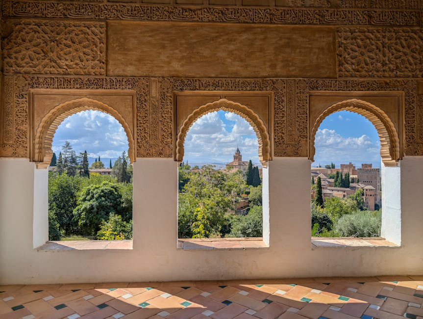 Alhambra arches looking out over the historic centre of Granada