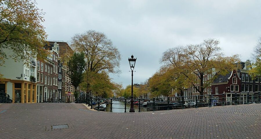 Amsterdam canal autumn trees walking from the museum