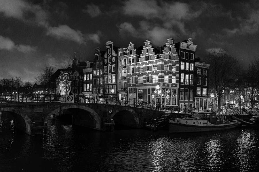 Amsterdam canal houses at night, black and white