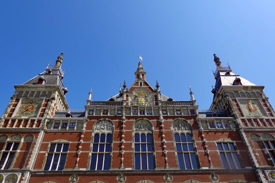 Amsterdam Centraal Station ornate facade with clock tower