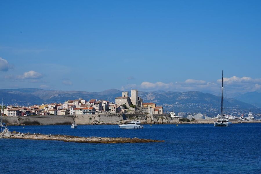 Antibes old town with stone ramparts and marina