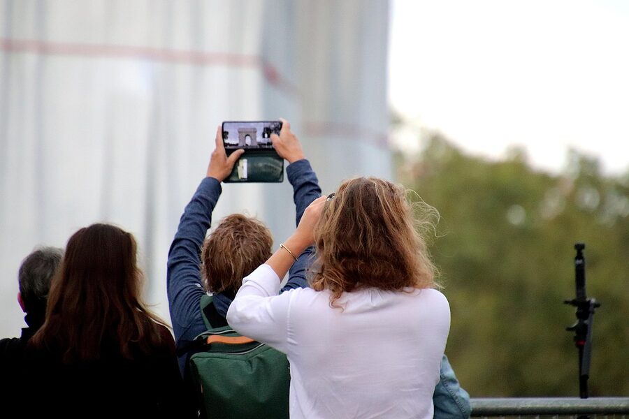 Tourists at the Arc de Triomphe Paris monument