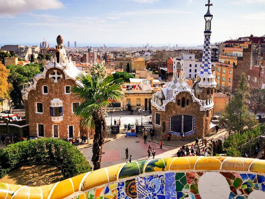 Park Güell entrance with Barcelona cityscape in the background