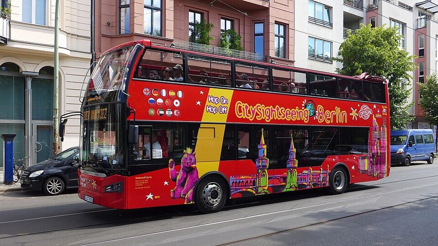 City Sightseeing Berlin red double-decker bus on Oranienburger Strasse