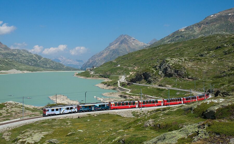 Bernina Express train at Lago Bianco on the Bernina Pass