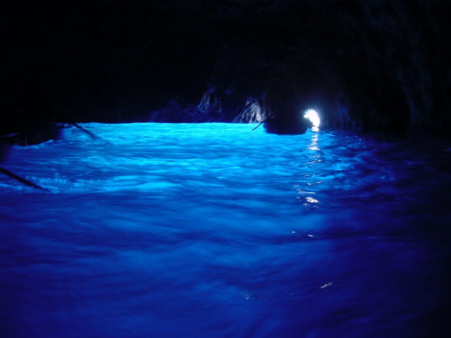 Inside the Blue Grotto Capri showing the blue water glow