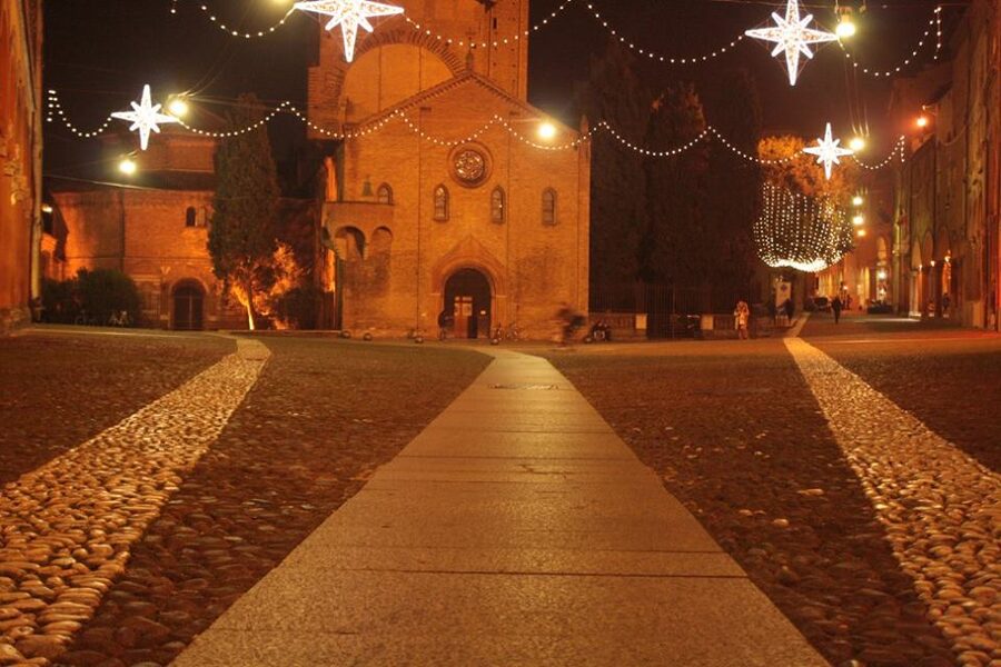 Piazza Santo Stefano Bologna at night with the seven churches
