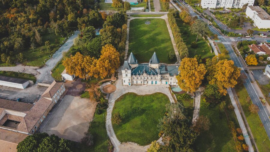 Bordeaux chateau aerial view in vineyard