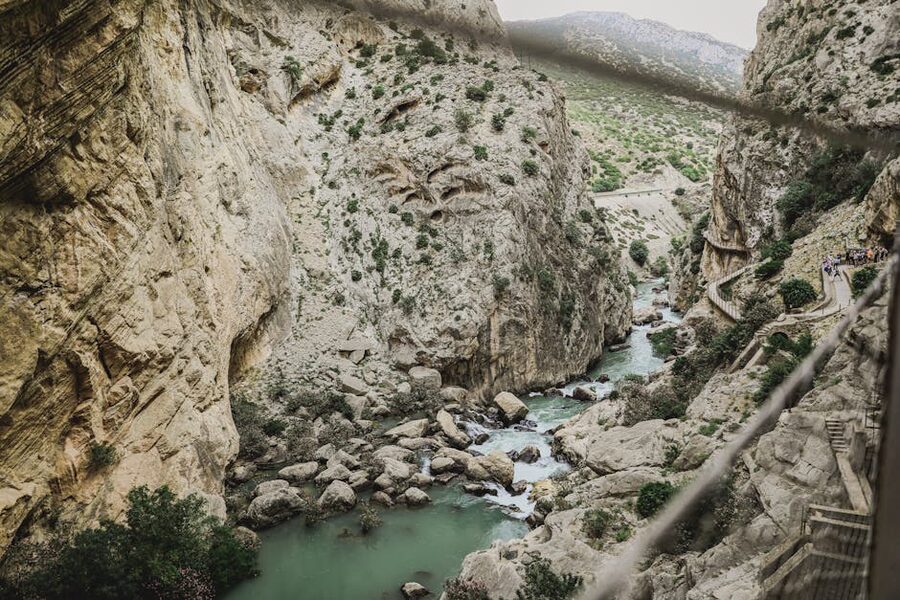 Group of people walking in the Caminito del Rey canyon