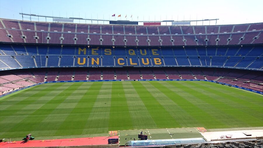 Camp Nou panoramic interior view with stadium slogan