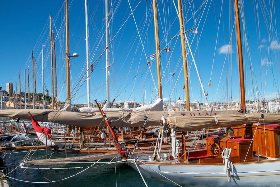 Wooden sailboats moored in Cannes marina