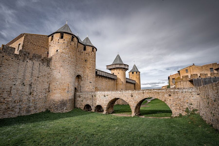 Stone walls and towers of Comtal castle Carcassonne