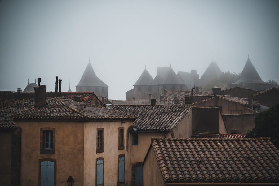 Misty morning over Carcassonne medieval towers