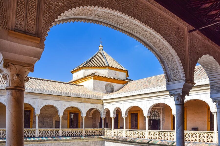 Casa de Pilatos courtyard arches Seville Spain