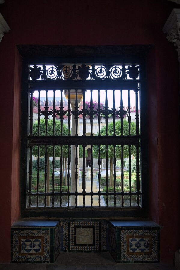 Mudejar window detail at Casa de Pilatos with carved plasterwork