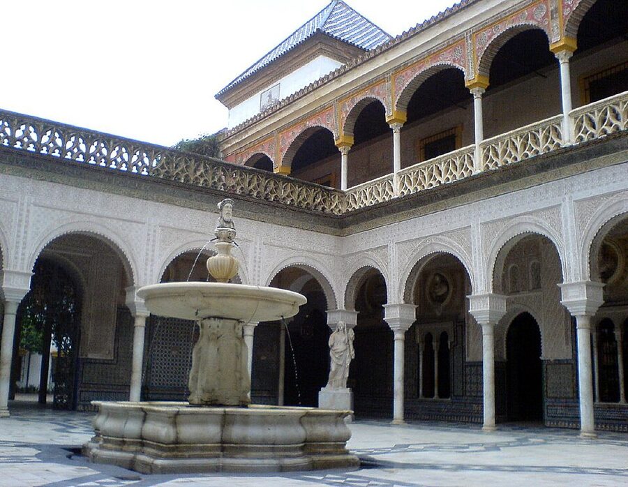 Patio Principal arches and tile work at Casa de Pilatos