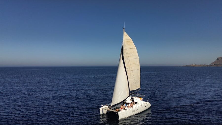 Sailing catamaran on the open sea