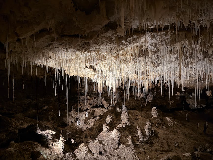Stalactites hanging cave ceiling