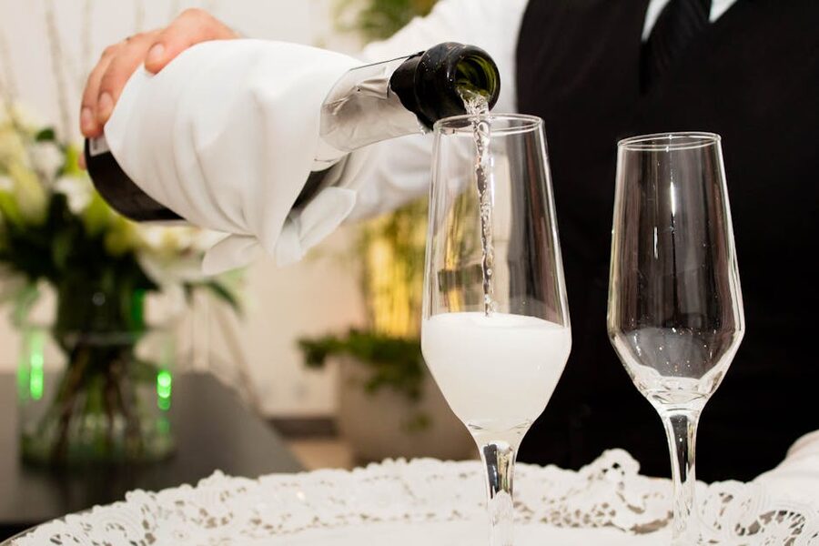 Champagne being poured into glasses for celebration