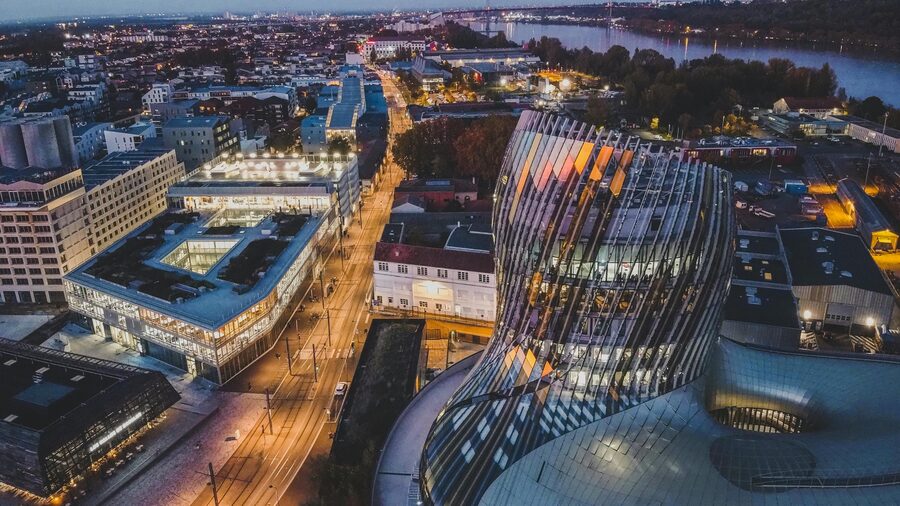Aerial night view Cite du Vin and Bordeaux