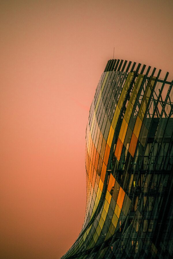 Cite du Vin curved facade at sunset