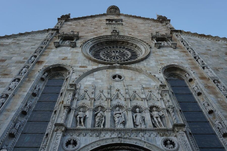 Gothic stone facade detail of Como Cathedral