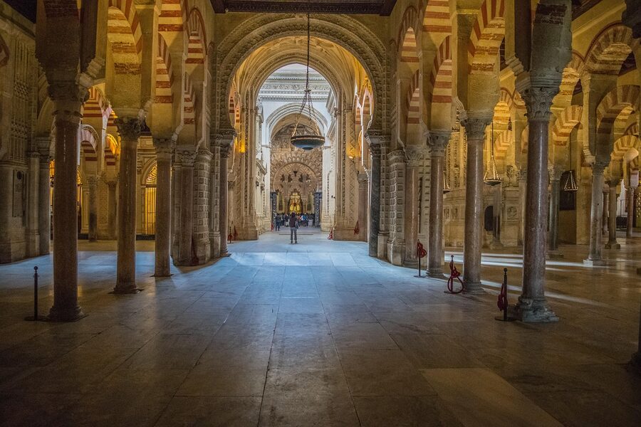 The pattern of arches receding through the prayer hall of the Cordoba mosque