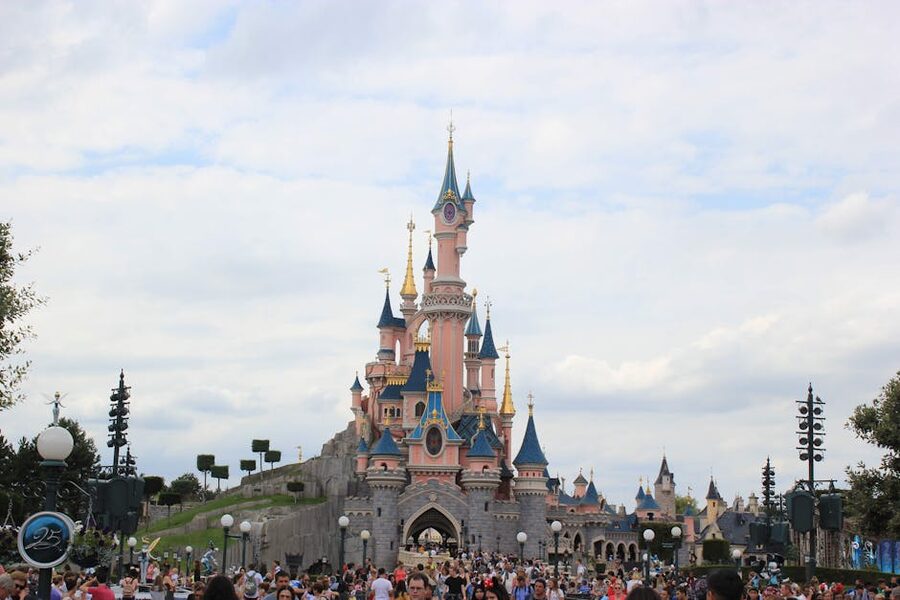 Sleeping Beauty Castle Disneyland Paris with daytime crowd