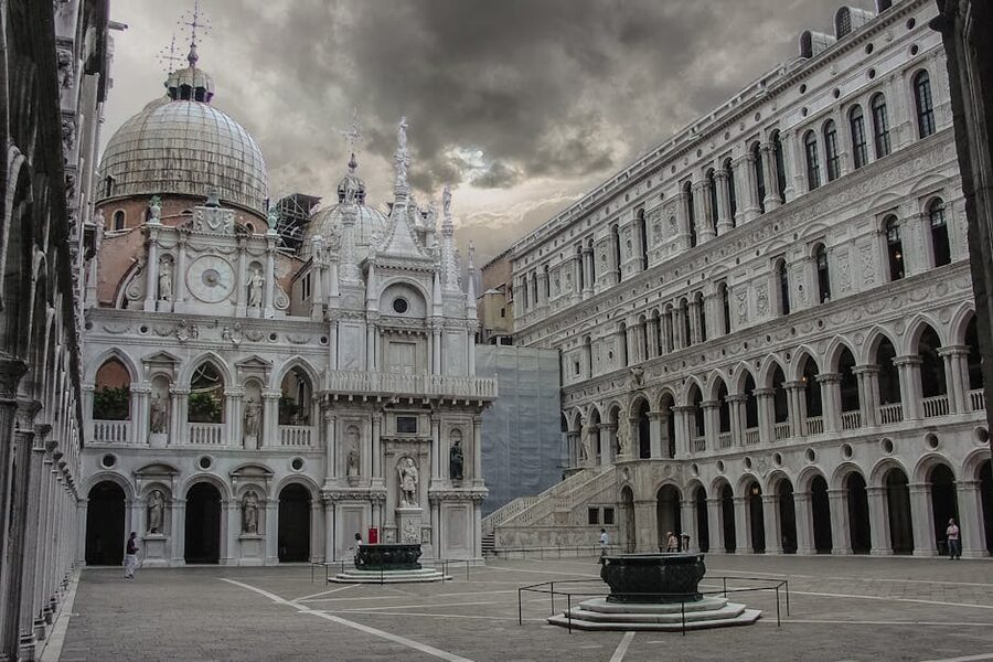 Doges Palace courtyard architecture under dramatic skies Venice
