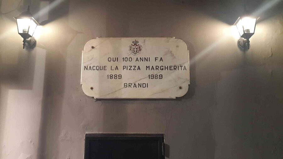 Plaque at Pizzeria Brandi commemorating the 1889 invention of the margherita