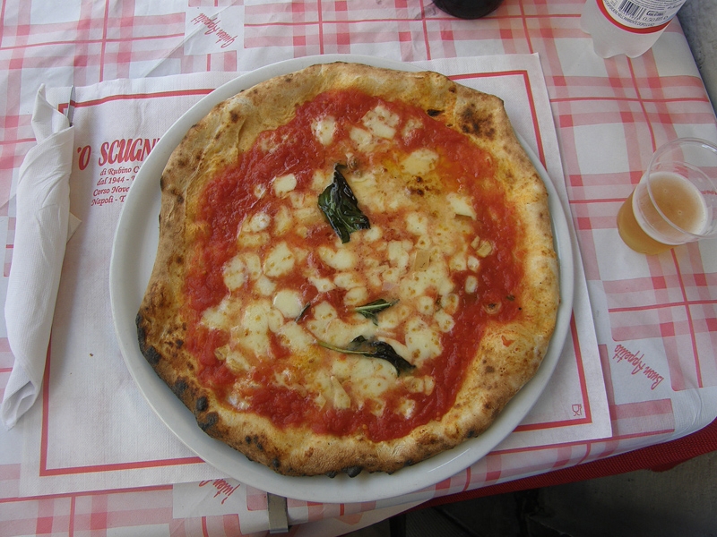 Naples pizza on a plate, ready to eat