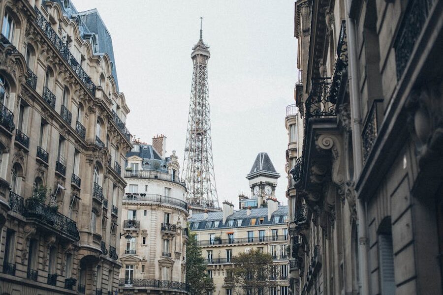 Eiffel Tower framed by Parisian buildings