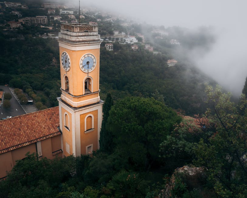 Èze's church tower in mist