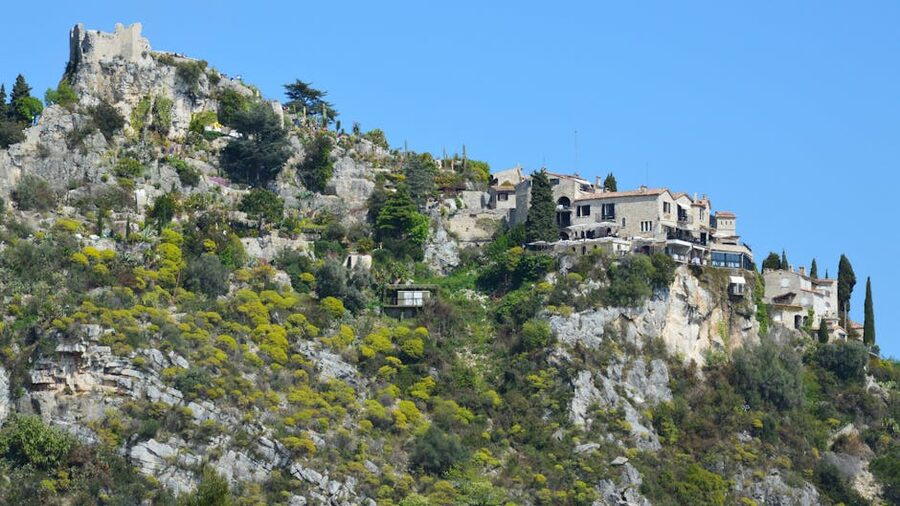 Stone houses of Eze village perched on a rocky cliff