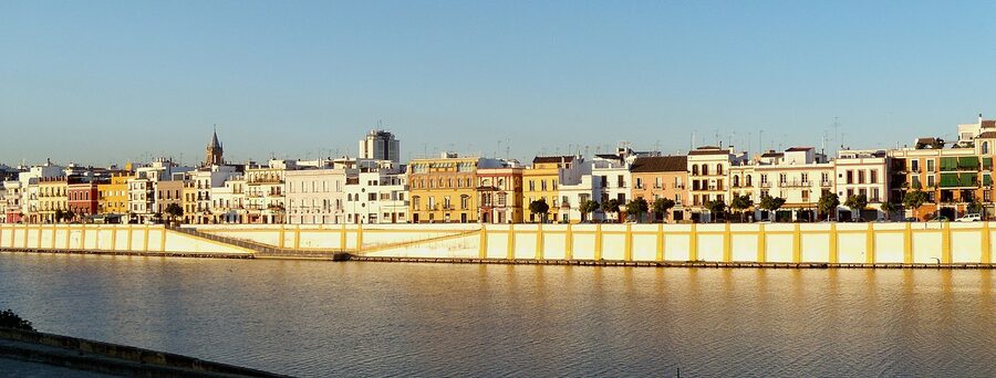 Calle Betis Triana waterfront Seville in morning light