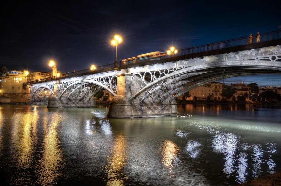 Triana Bridge over the Guadalquivir at night Seville
