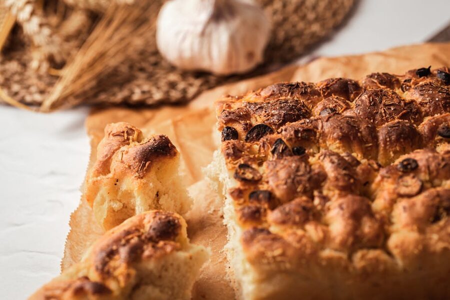 Genoese focaccia with garlic and rosemary, freshly baked