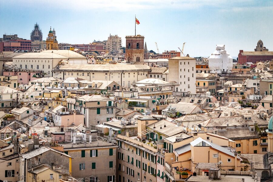 Genoa old town with medieval tower and historic buildings