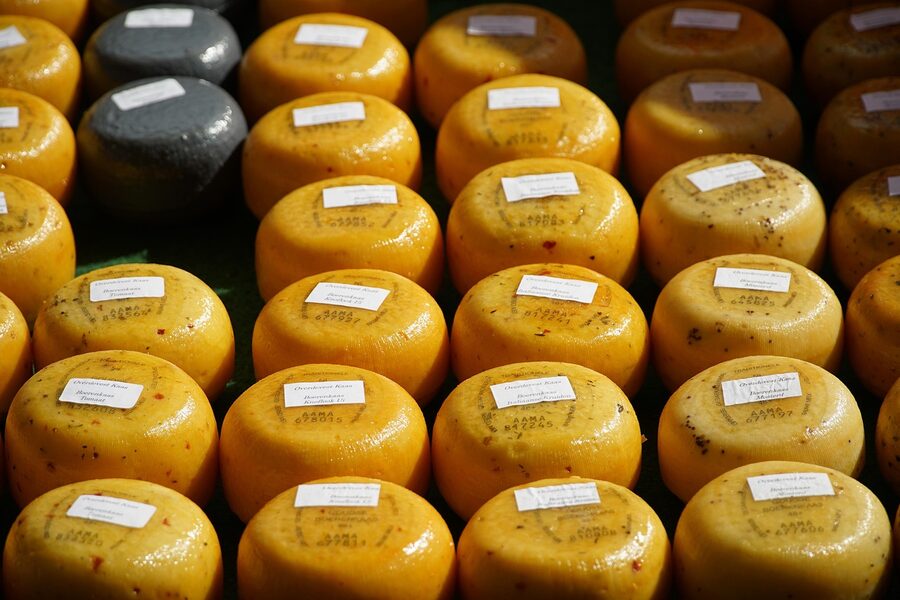 Wheels of Gouda cheese on display at a Dutch market