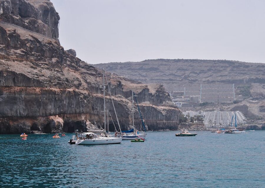 Sailboats and catamarans moored in a Gran Canaria bay