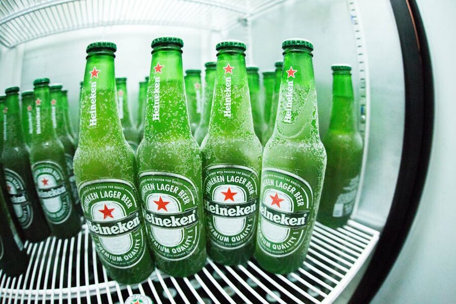 Frosted Heineken bottles in refrigerator