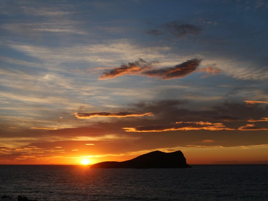 Dramatic sunset over Cala Comte in Ibiza