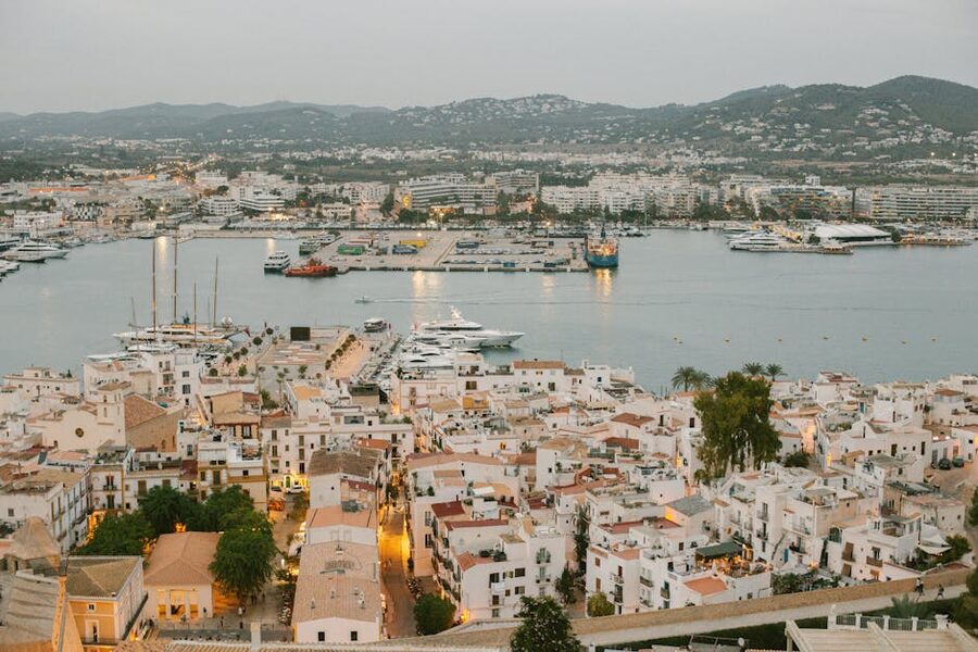 Aerial view of Ibiza port with yachts and panoramic cityscape